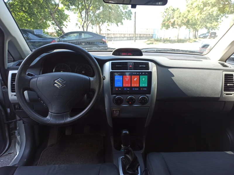 Suzuki Liana, снимка 9 - Автомобили и джипове - 52473155