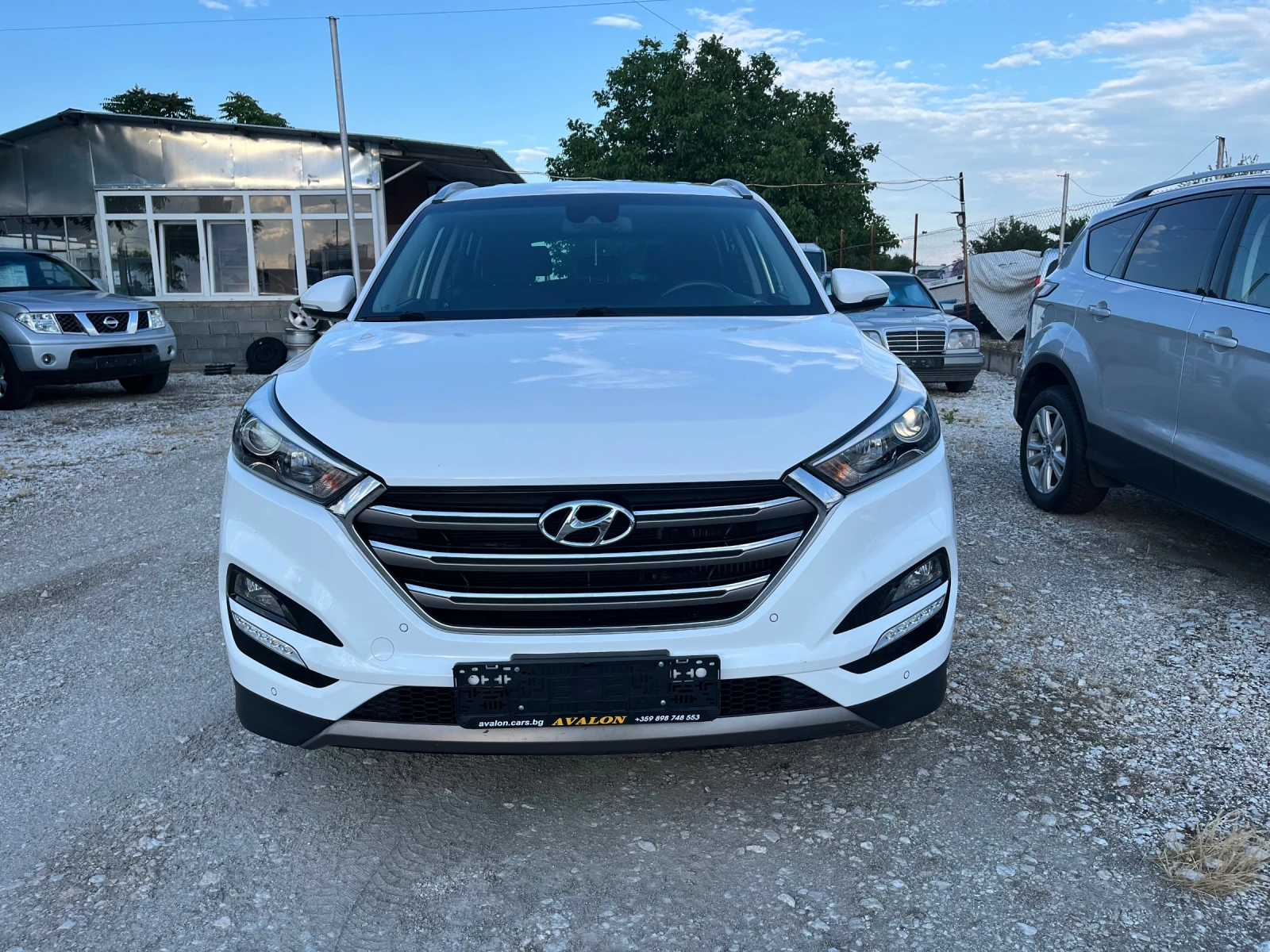 Hyundai Tucson 2.0D Автомат 4х4, снимка 2 - Автомобили и джипове - 56106120