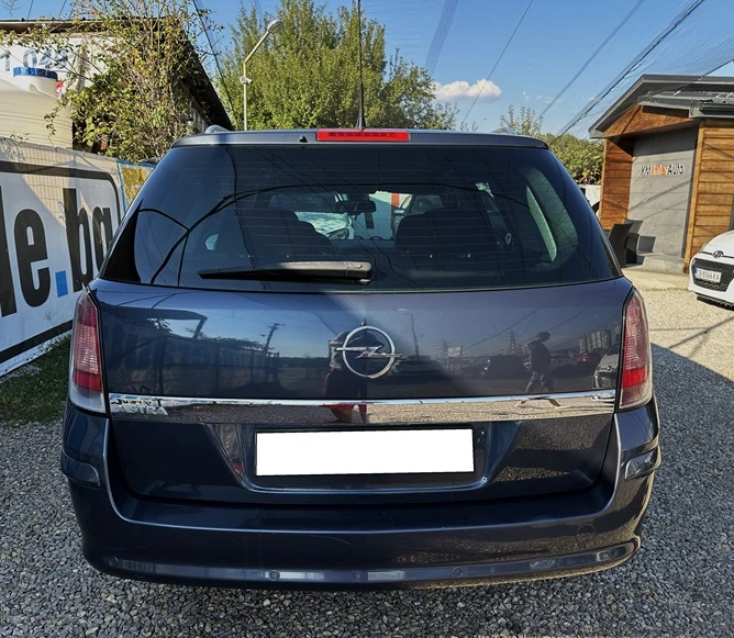 Opel Astra SW 1.6i Facelift, снимка 5 - Автомобили и джипове - 47387262