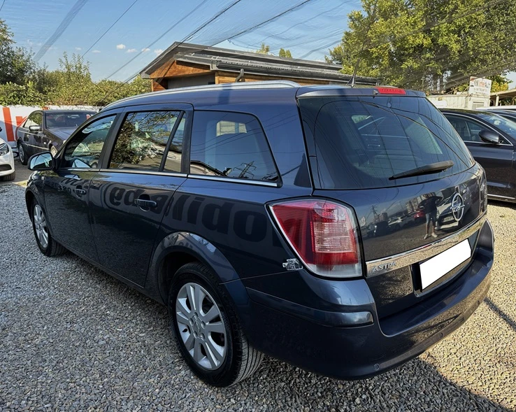 Opel Astra SW 1.6i Facelift, снимка 6 - Автомобили и джипове - 47387262