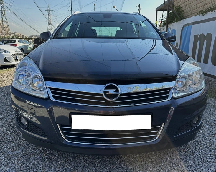 Opel Astra SW 1.6i Facelift, снимка 2 - Автомобили и джипове - 47387262