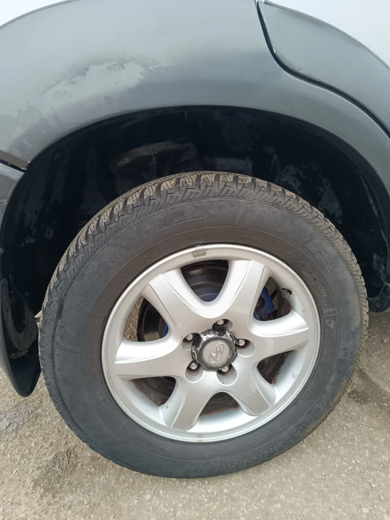Hyundai Tucson 2.0, снимка 10 - Автомобили и джипове - 51529811