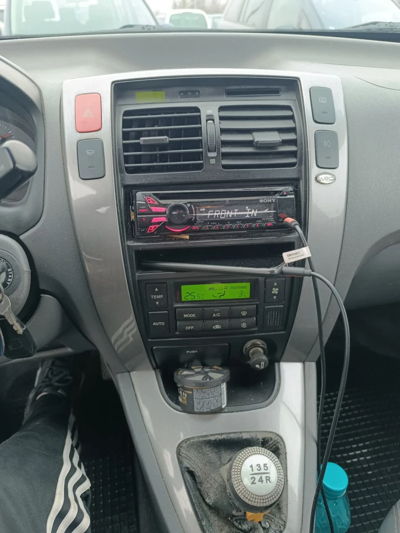 Hyundai Tucson 2.0, снимка 14 - Автомобили и джипове - 51529811