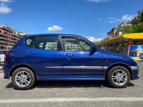 Daihatsu Sirion 1.3 4x4, снимка 2 - Автомобили и джипове - 45355792