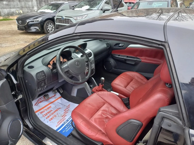 Opel Tigra 1.4i, снимка 8 - Автомобили и джипове - 43296436