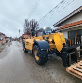 Телескопичен товарач Caterpillar CAT 407, снимка 13