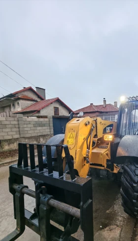 Телескопичен товарач Caterpillar CAT 407, снимка 12