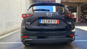 Обява за продажба на Mazda CX-5 Turbo Premium Plus 2024 3200км ~58 500 лв. - изображение 4 | Auto.bg Обява за продажба на Mazda CX-5 Turbo Premium Plus 2024 3200км ~58 500 лв. - изображение 4