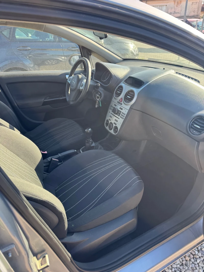 Opel Corsa 1.2i / 4-Цилиндъра / Обслужена , снимка 8 - Автомобили и джипове - 52943228