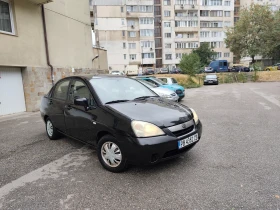 Suzuki Liana 1.6 ГАЗ-ИНЖ* КЛИМАТИК* !ТОП! - 1999 лв. / 1022.07 € - 13930728 7