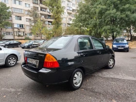 Suzuki Liana 1.6 ГАЗ-ИНЖ* КЛИМАТИК* !ТОП! - 1999 лв. / 1022.07 € - 13930728 5